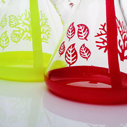 Tree artwork on clear beaker glass water pipe