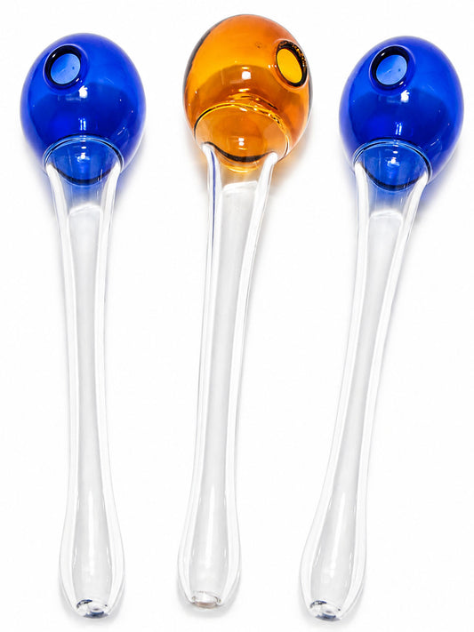 Three glass maracas on a white background, featuring blue and amber-colored spherical heads with clear glass stems.