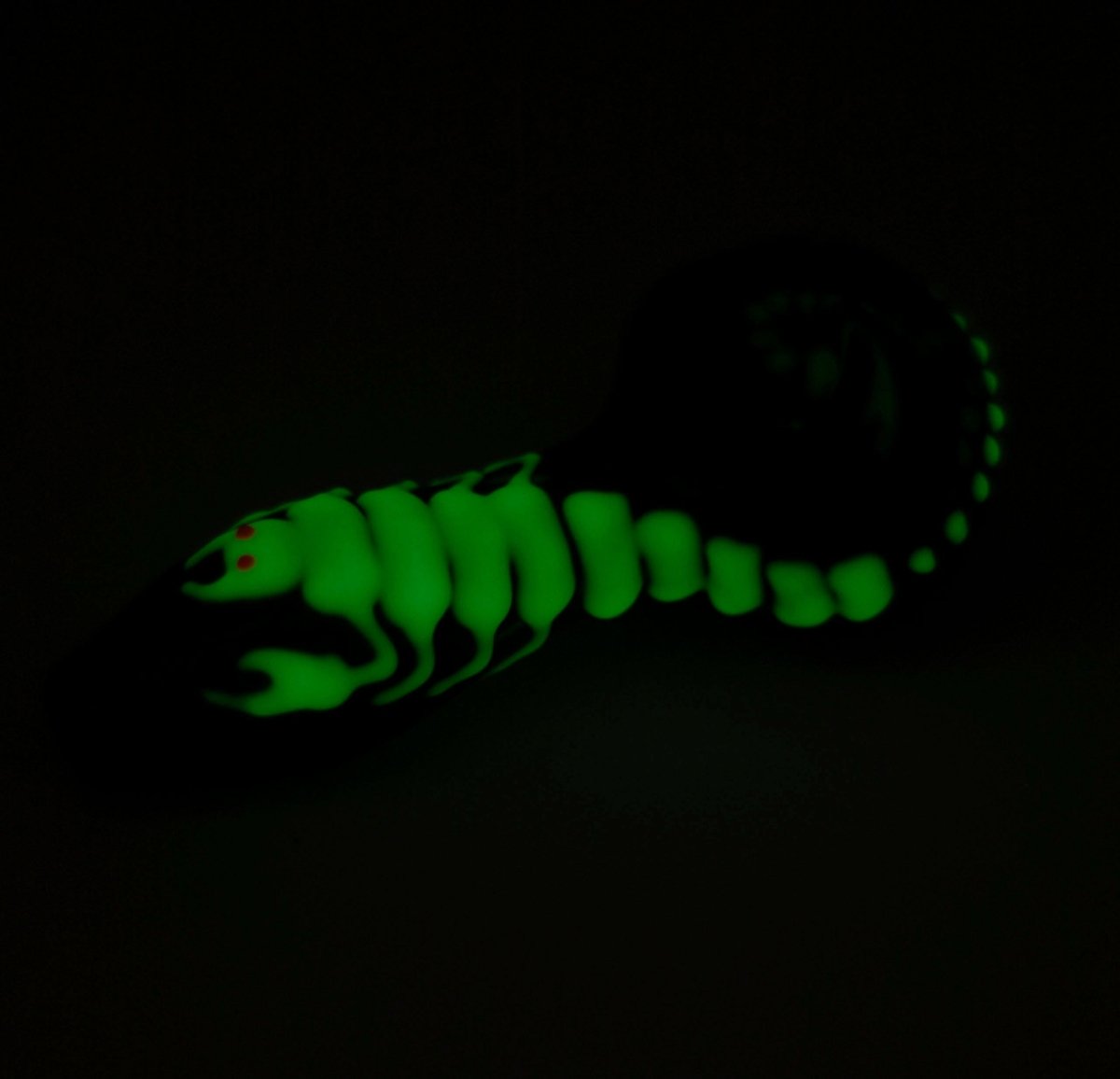 Glow scorpion detail on green glass pipe