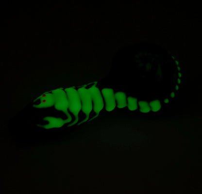 Glow scorpion detail on green glass pipe