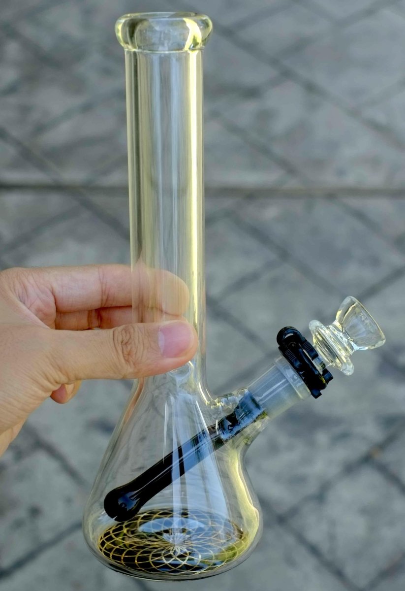 Gold web-style base detail on clear beaker water pipe