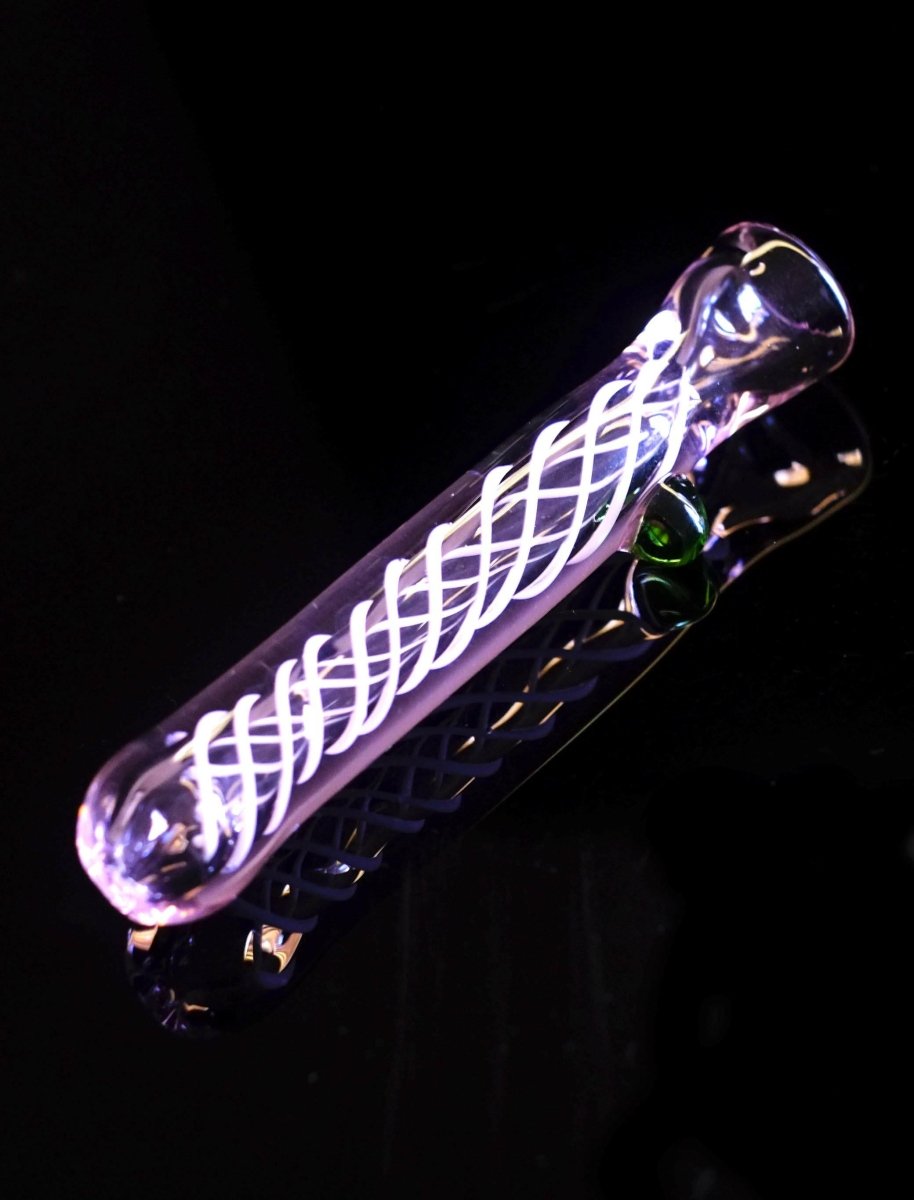 Swirl and bead detail on pink glass chillum