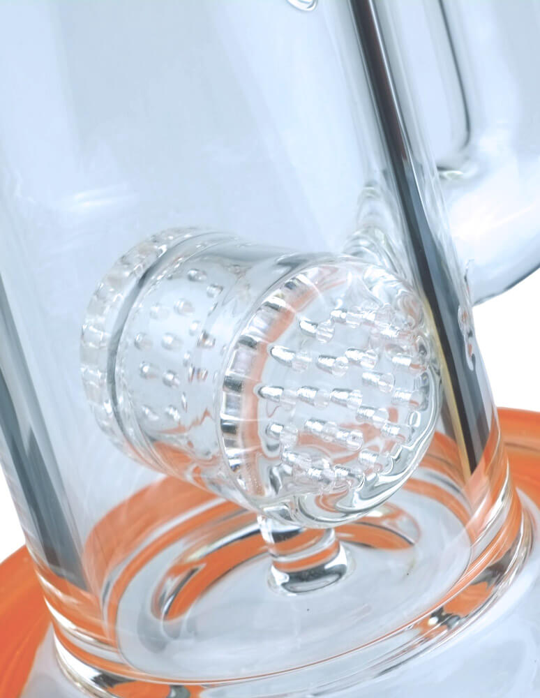 Clear glass bong with built-in barrel percolator detail